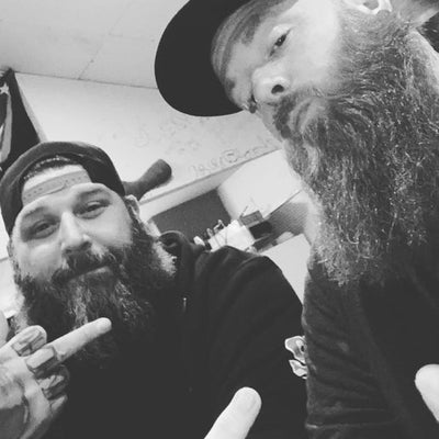 OG Josh and Ace sitting in a Clubhouse bar, black and white photo